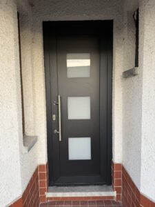 Porte entrée pvc tirant noire mat 